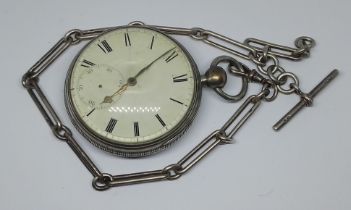 A hallmarked silver pocket watch with silver trombone link Albert chain.