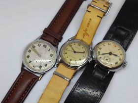 A group of three early to mid 20th century mechanical wristwatches comprising a Benrus, an