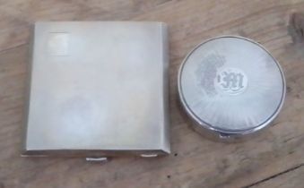 Two hallmarked silver compacts.