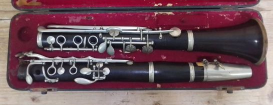 A nickel mounted clarinet marked 'ALP Croes Bruxelles'