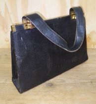 A vintage Jane Shilton lizard skin handbag.