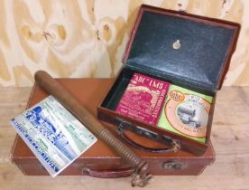 A vintage containing truncheon and a leather case of railway ephemera.