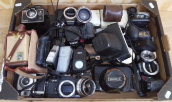 A box of mixed cameras including Ricoh KR10, Minolta, Yashica, etc
