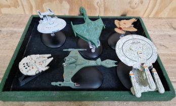 A group of 6 assorted model starships comrising of 1 star wars & 5 Star Trek.