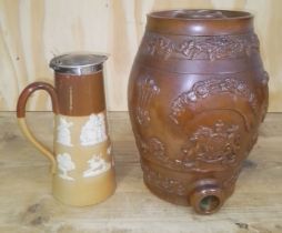 A salt glazed spirit barrel with royal crest and a Doulton Lambeth jug with hallmarked silver top.