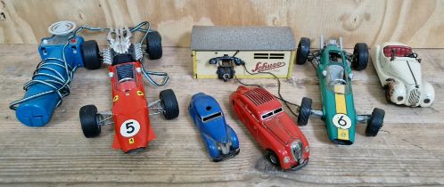 A group of Schuco vintage toys comprising of 3 metal cars (Kommando Anno 2000 red, 3000 blue,