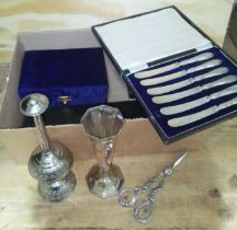 A box of assorted silver plated ware.