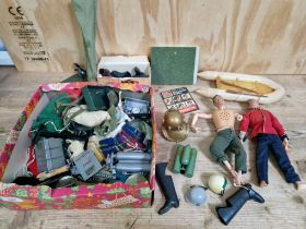 A box containing 2 Action man dolls and accessories etc.