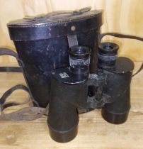 A pair of WWII United States naval 7x50 binoculars by Bausch & Lomb with leather case.