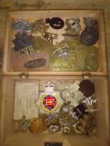 A WWI pair awarded to 493974 PTE. G.A. Wilson Labour Corps together with various cap badges and