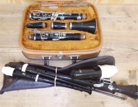 A Lafleur clarinet in case together with two recorders.