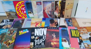 A box of assorted vinyl LPs, various genre.