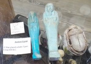 Two Ancient Egyptian blue glazed Ushabti figures, circa 600 BC, length 10 & 12cm, together with a