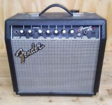 A Fender 15R guitar amp.