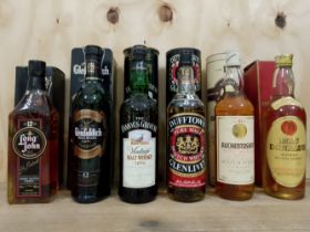 Six bottles of whisky; Auchentoshan 10 year old, Long John Macdonald 12 year old, Dufftown