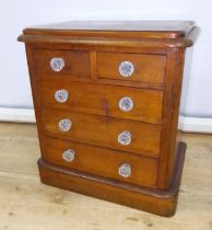 A Victorian "Apprentice" chest of drawers, height 40cm.