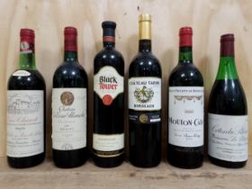 A mixed lot of alcohol comprising 1970s, 1980s and modern wines and a bottle of Deutz 1978 Campagne.