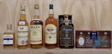 A mixed lot of whisky comprising Ballentine's 12 year old Scotch whisky, Bell's Scotch whisky 1L,