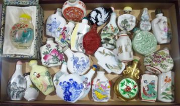 A collection of approx. 26 Chinese snuff bottles, mainly porcelain, also including cinnabar lacquer,