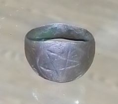 A medieval white metal ring, the seal/signet engraved with a Pagan star. Provenance, deceased