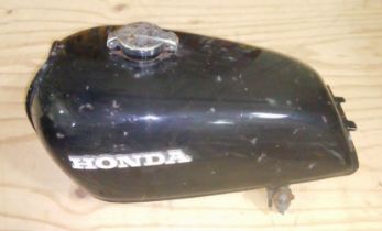 A Honda motorcycle petrol tank.