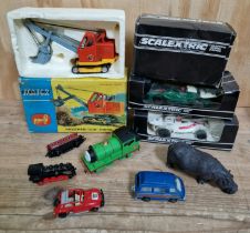 A tray of assorted toys to include a boxed Corgi priestman "cub" shovel 1128, 2 boxed scalexric cars