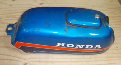 A Honda motorcycle petrol tank.