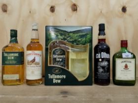 Five bottles of whisky; two 70cl bottles of Tullamore Dew Irish whisky (one in presentation box with