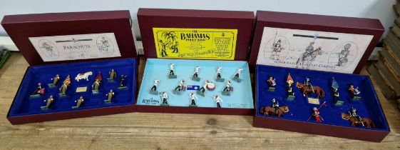 Three large boxed sets of Britains lead soldiers; 5187 Bahamas Police Band 11 pieces, 5190 Parachute