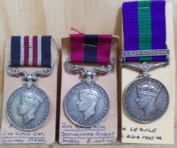 Three WWII medals comprising a Distinguished Conduct and Military Medal inscribed 'King T.E.L. 5th