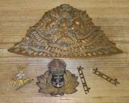 A 12th (Prince of Wales Royal) Lancers triangular brass lance cap plate 1905-1914, battle honours up