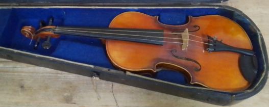 A Joesph Guaruerius copy violin, with hard case.