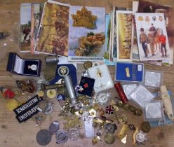 A quantity of badges, buttons, medals etc.