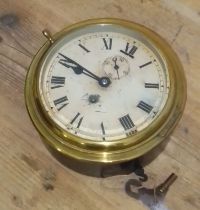 A ship's bulkhead clock, diam. 19cm.