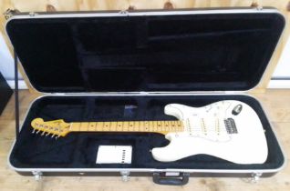 A Fender Stratocaster, made in Japan, circa 1989, serial number I005813, with Gator hard case.