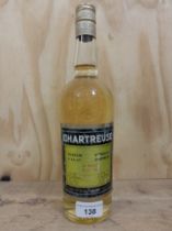 A bottle of vintage Chartreuse Liqueur, green label.