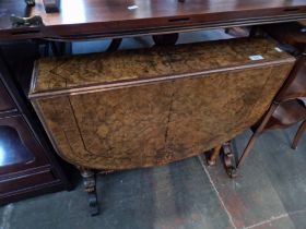 A Victorian inlaid walnut Sutherland table.