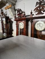 A Gustav Becker Vienna wall clock complete with weights, pendulum and key.