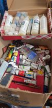 A box of assorted artist's requisites, paints, printing blocks etc.