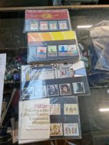 40 presentation packs of mint stamps