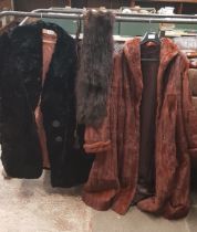 2 fur coats and a stole
