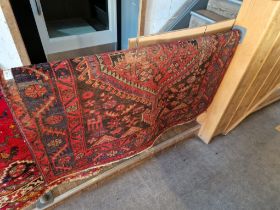 A vintage hand knotted Afghan wool carpet, 204 x 128cm appx