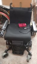 A Drive DeVilbiss motorised electric wheelchair.