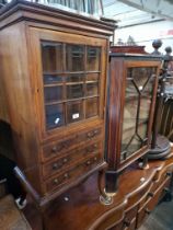 An Edwardian inlaid mahogany music cabinet and similar corner cabinet.