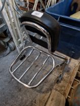 A Harley-Davidson chrome backrest/luggage rack.