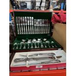 A canteen of Newbridge Kings pattern silver plated cutlery together with a Kings pattern carving