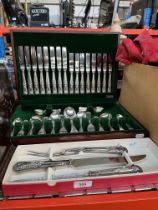 A canteen of Newbridge Kings pattern silver plated cutlery together with a Kings pattern carving