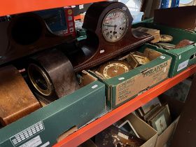 Four boxes of assorted clocks, clock parts and vintage radios.