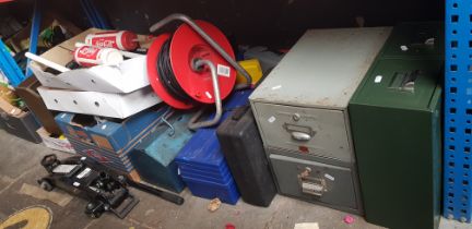 A quantity of garage ware to include 2 ton trolley jack, 2 cable reels, bike parts, metal drawers,