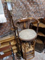 A mixed lot comprising Edwardian tub chair, pair of rush seat chairs and a mahogany standard lamp.